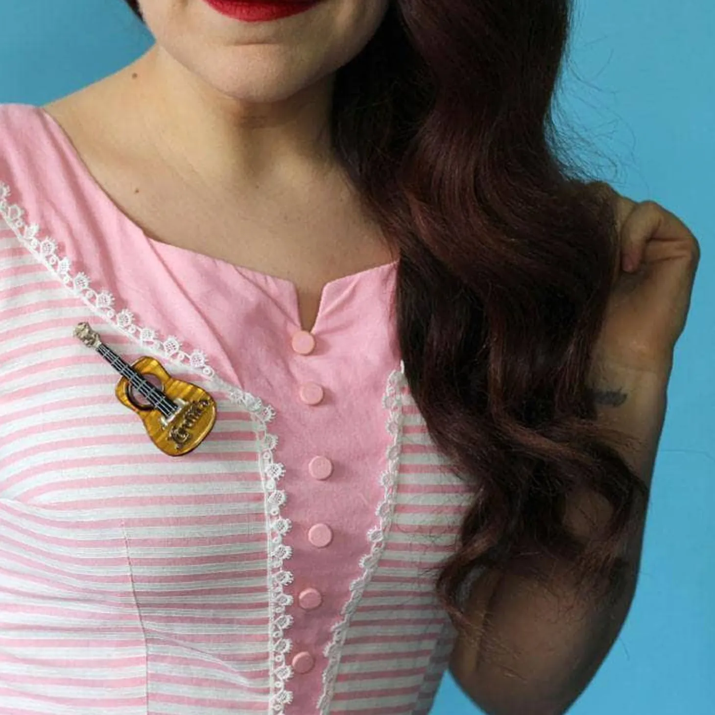 Celebrated Six String Brooch