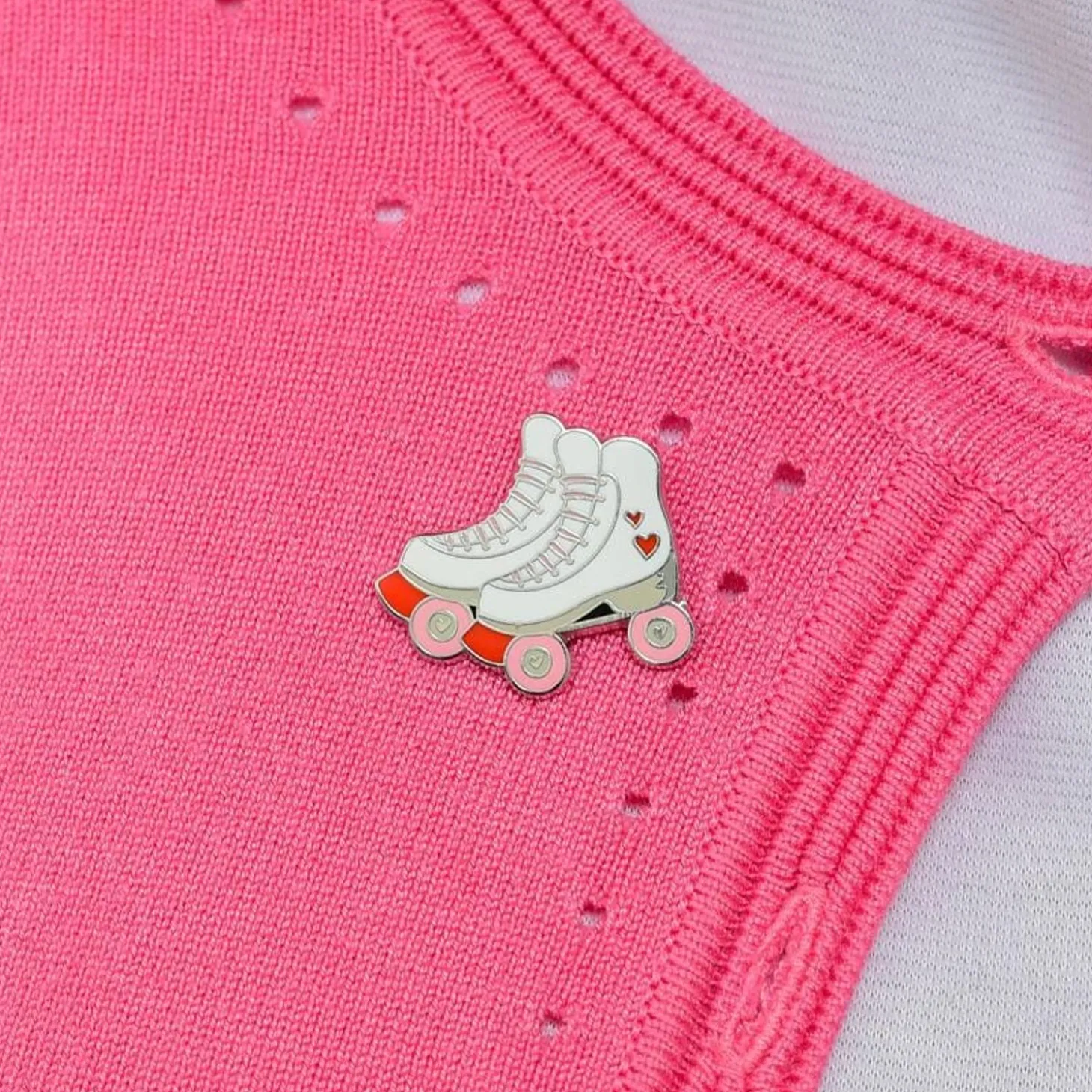 Rollicking Rollerskates Enamel Pin