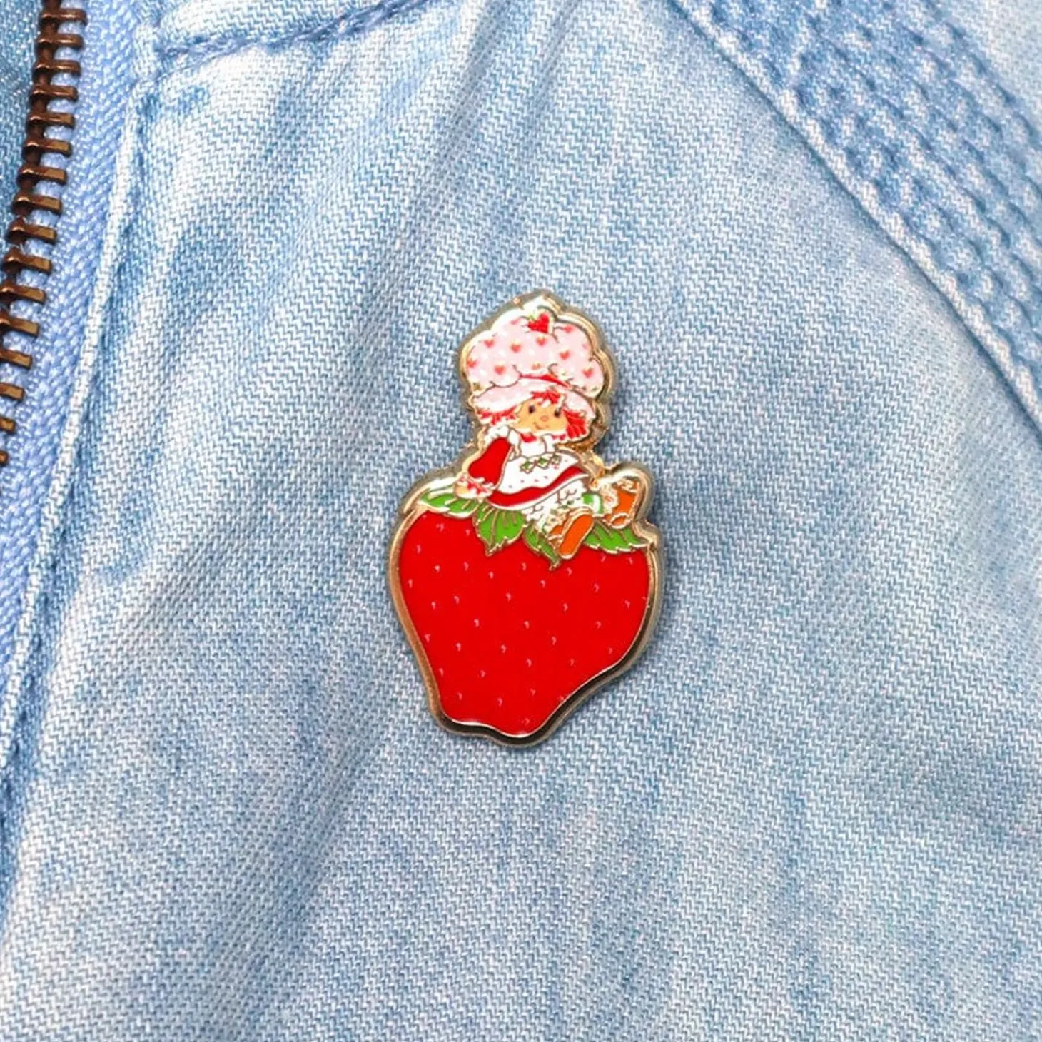 Sitting On A Strawberry Enamel Pin