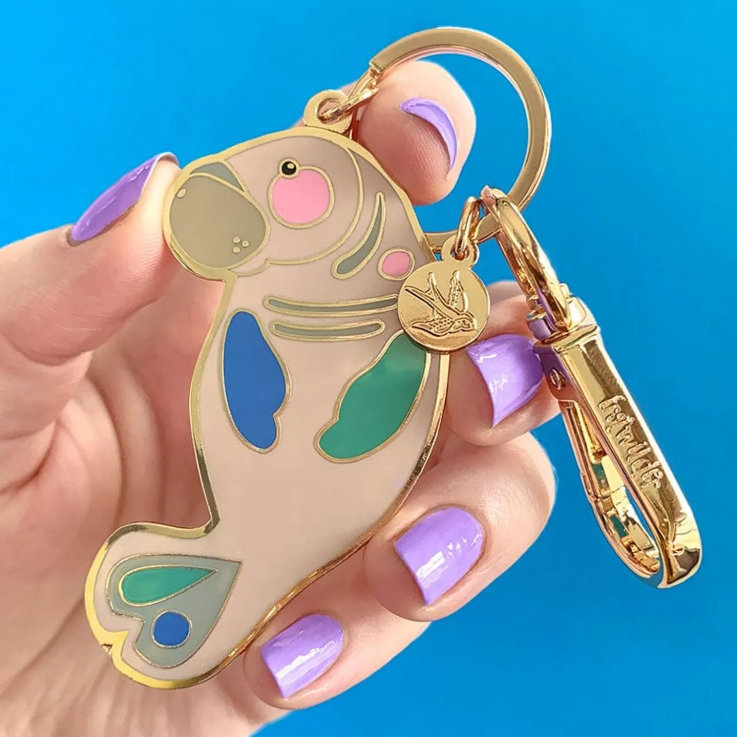 The Dutiful Dugong Enamel Key Ring